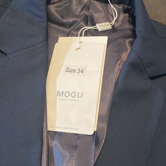 Men’s Blue Slim Fit 2 Piece Suit
OneButton Notched Lapel Jacket 34 Pants 31 NWT - Picture 7 of 14